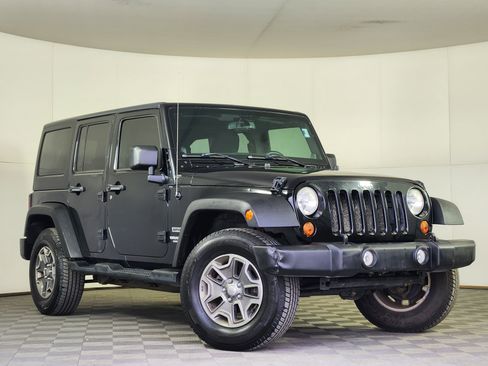 Used 2013 Jeep Wrangler Unlimited Sport image 1