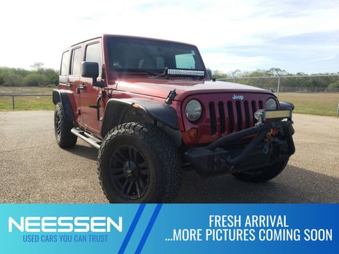 Used 2012 Jeep Wrangler Unlimited Sport image 1