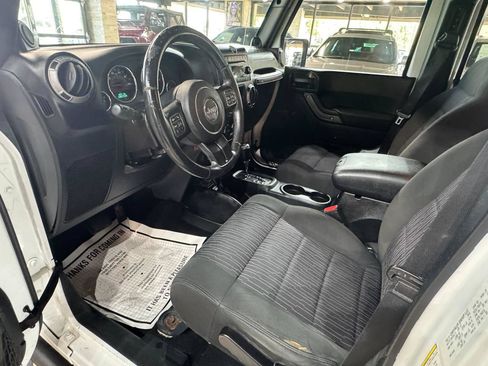 Used 2012 Jeep Wrangler Unlimited Sport w/ Connectivity Group AWD/4WD image 16