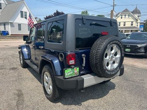 Used 2013 Jeep Wrangler Unlimited Sahara w/ Dual Top Group AWD/4WD image 11