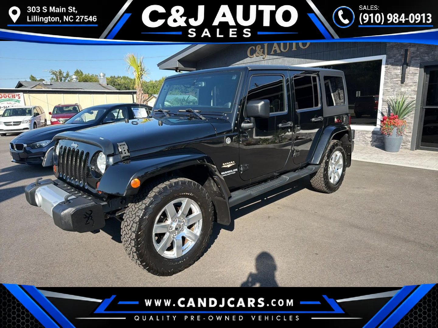 Used 2013 Jeep Wrangler Unlimited Sahara w/ Dual Top Group AWD/4WD image 1