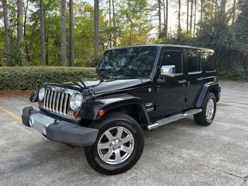Used 2013 Jeep Wrangler Unlimited Sahara w/ Dual Top Group image 2