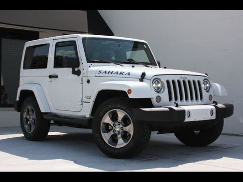 Used 2016 Jeep Wrangler Sahara AWD/4WD image 1