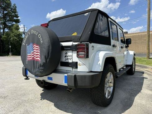Used 2013 Jeep Wrangler Unlimited Sahara w/ Dual Top Group AWD/4WD image 11