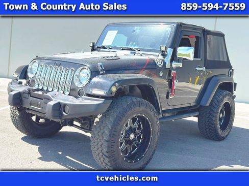 Used 2016 Jeep Wrangler Sahara AWD/4WD image 1