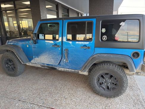 Used 2016 Jeep Wrangler Unlimited Sport image 1