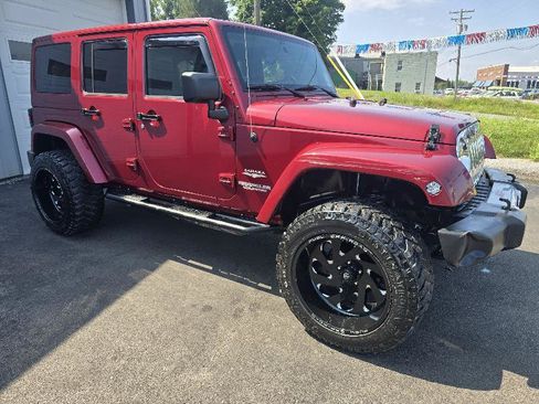 Used 2012 Jeep Wrangler Unlimited Sahara w/ Dual Top Group AWD/4WD image 5