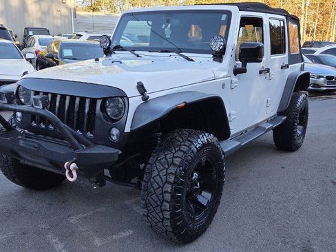 Used 2014 Jeep Wrangler Unlimited Sahara image 1