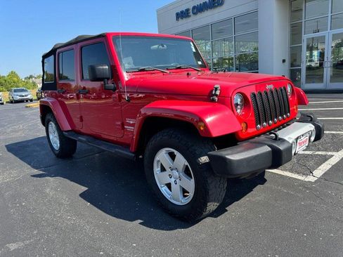 Used 2011 Jeep Wrangler Unlimited Sahara w/ Dual Top Group AWD/4WD image 2