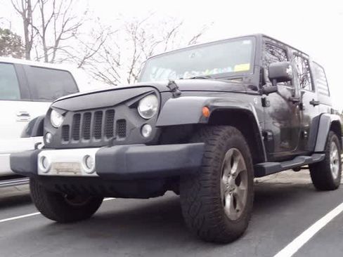 Used 2015 Jeep Wrangler Unlimited Sahara image 1