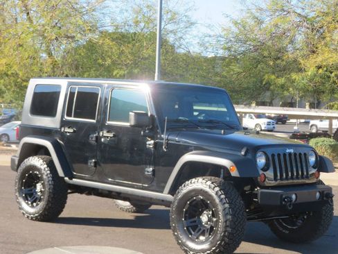Used 2009 Jeep Wrangler Unlimited Rubicon w/ Dual Top Group image 4
