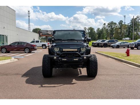 Used 2014 Jeep Wrangler Unlimited Sahara w/ Max Tow Package image 2