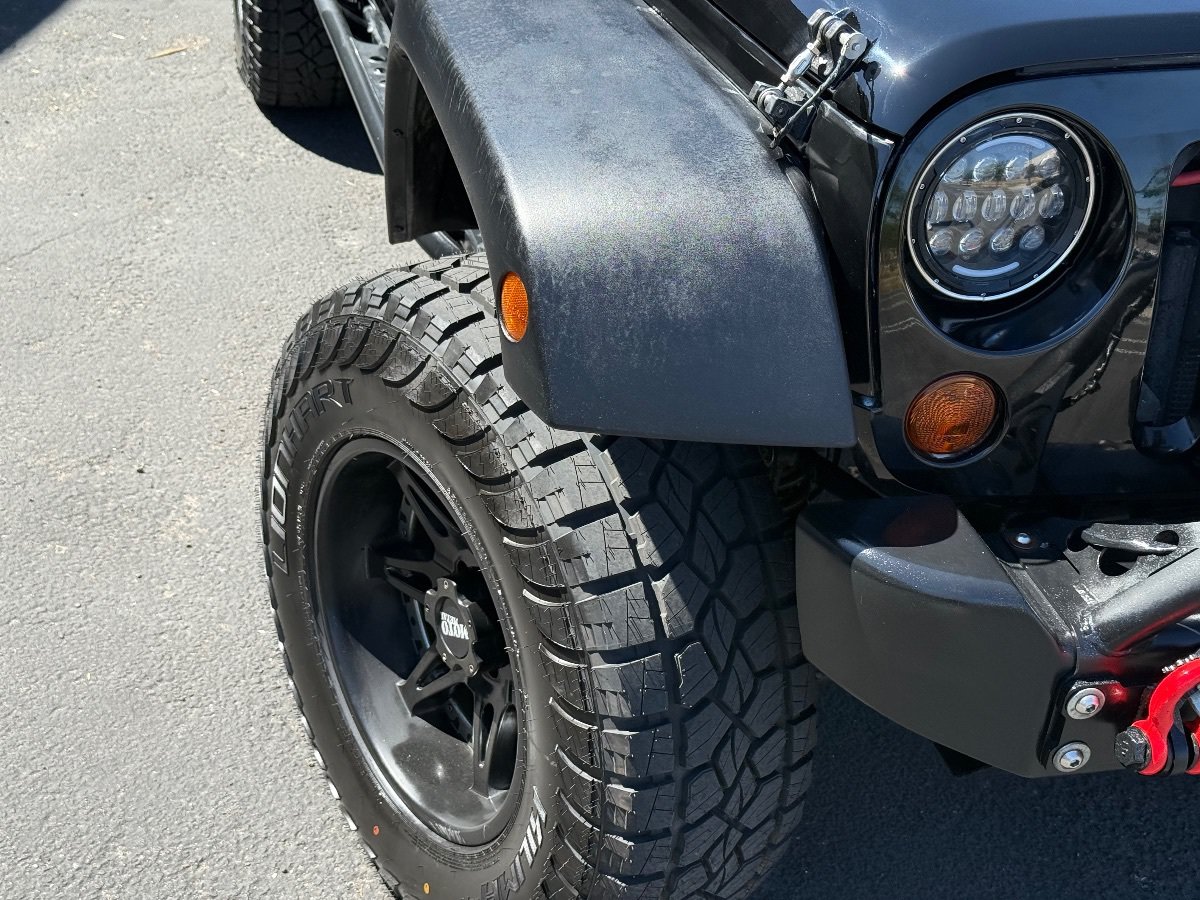 Used 2012 Jeep Wrangler Unlimited Sport w/ Max Tow Pkg AWD/4WD image 3