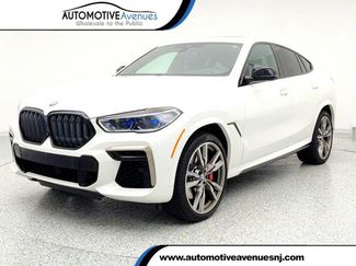 Used 2022 BMW X6 M50i w/ Executive Package AWD/4WD video 1