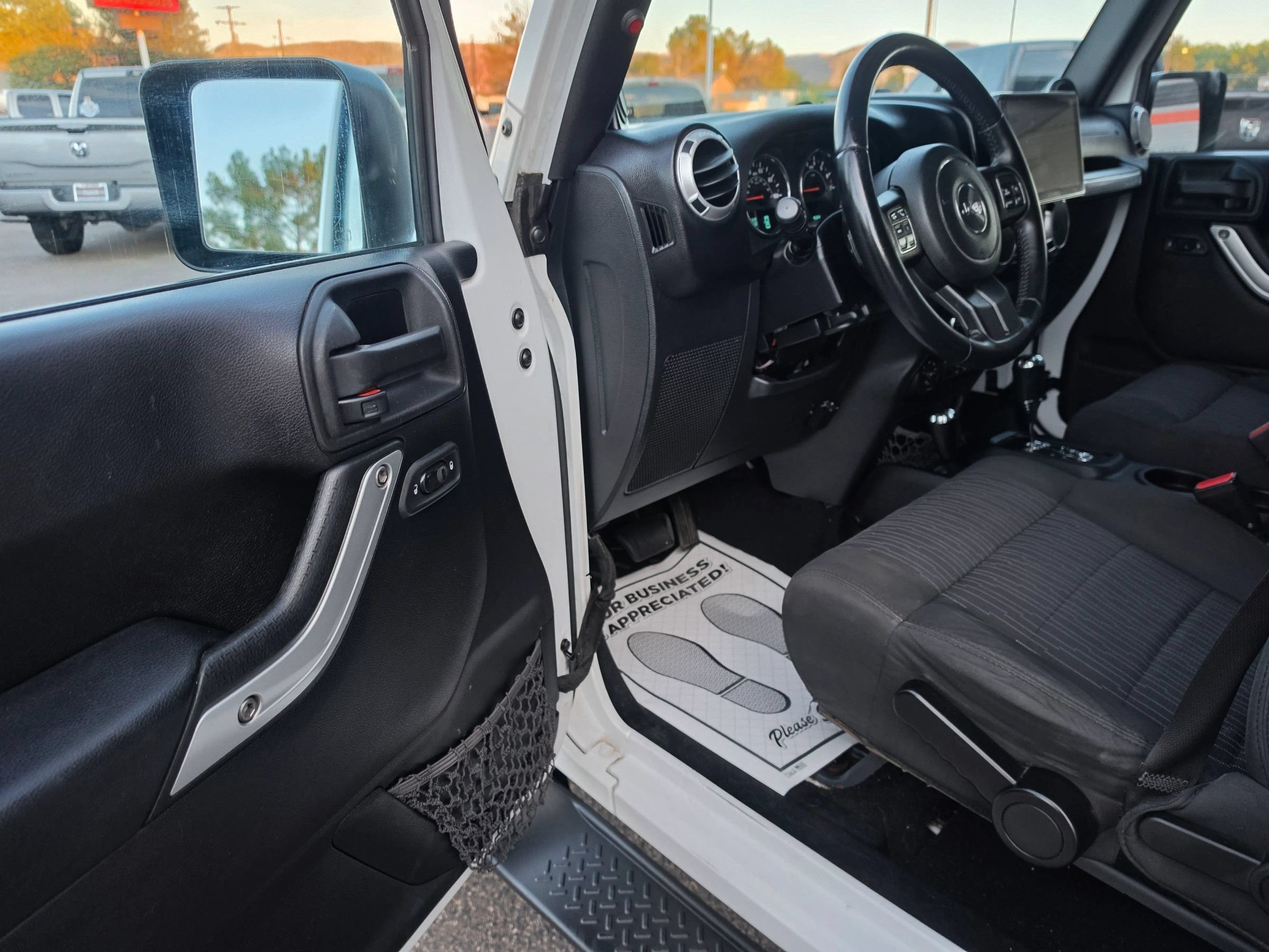 Used 2012 Jeep Wrangler Unlimited Sahara w/ Dual Top Group AWD/4WD image 13