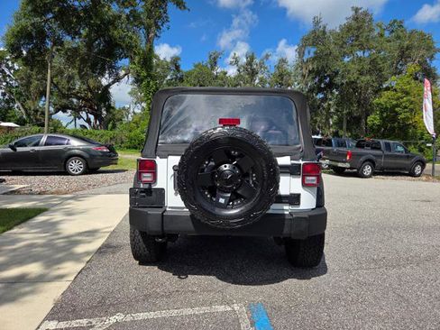 Used 2013 Jeep Wrangler Sport w/ Mopar Black Appearance Group image 9