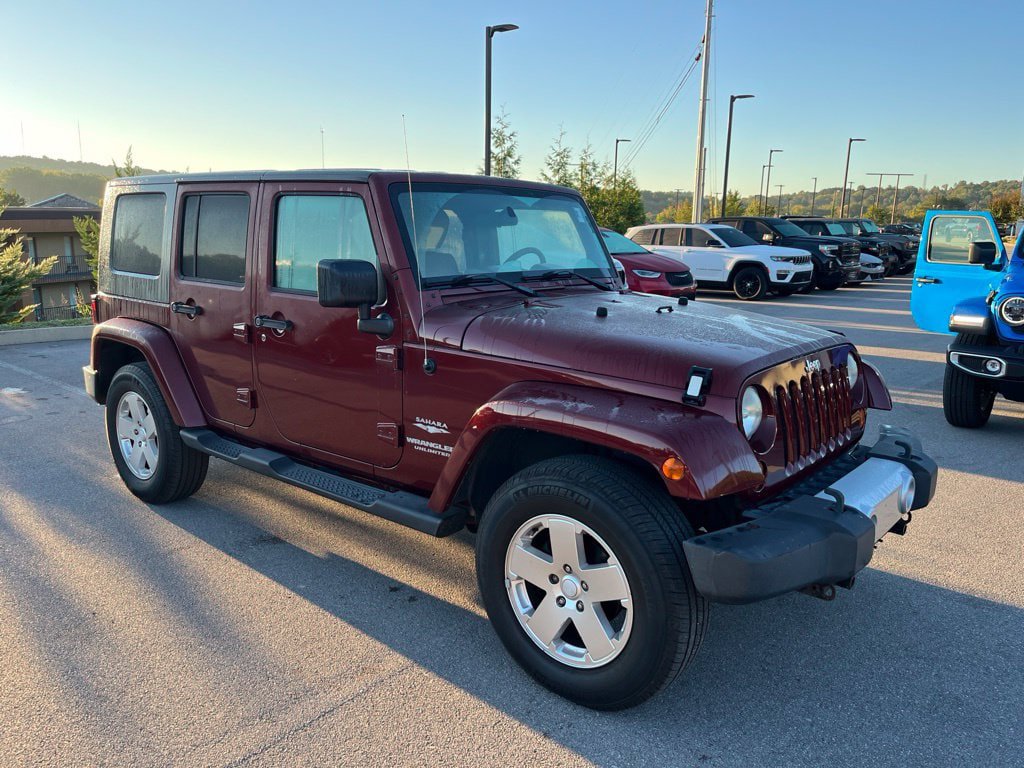 Used 2010 Jeep Wrangler Unlimited Sahara w/ Dual Top Group AWD/4WD image 2