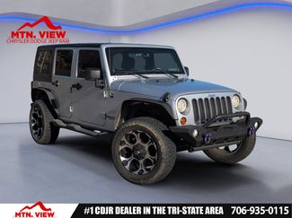 Used 2012 Jeep Wrangler Unlimited Sahara w/ Dual Top Group video 1