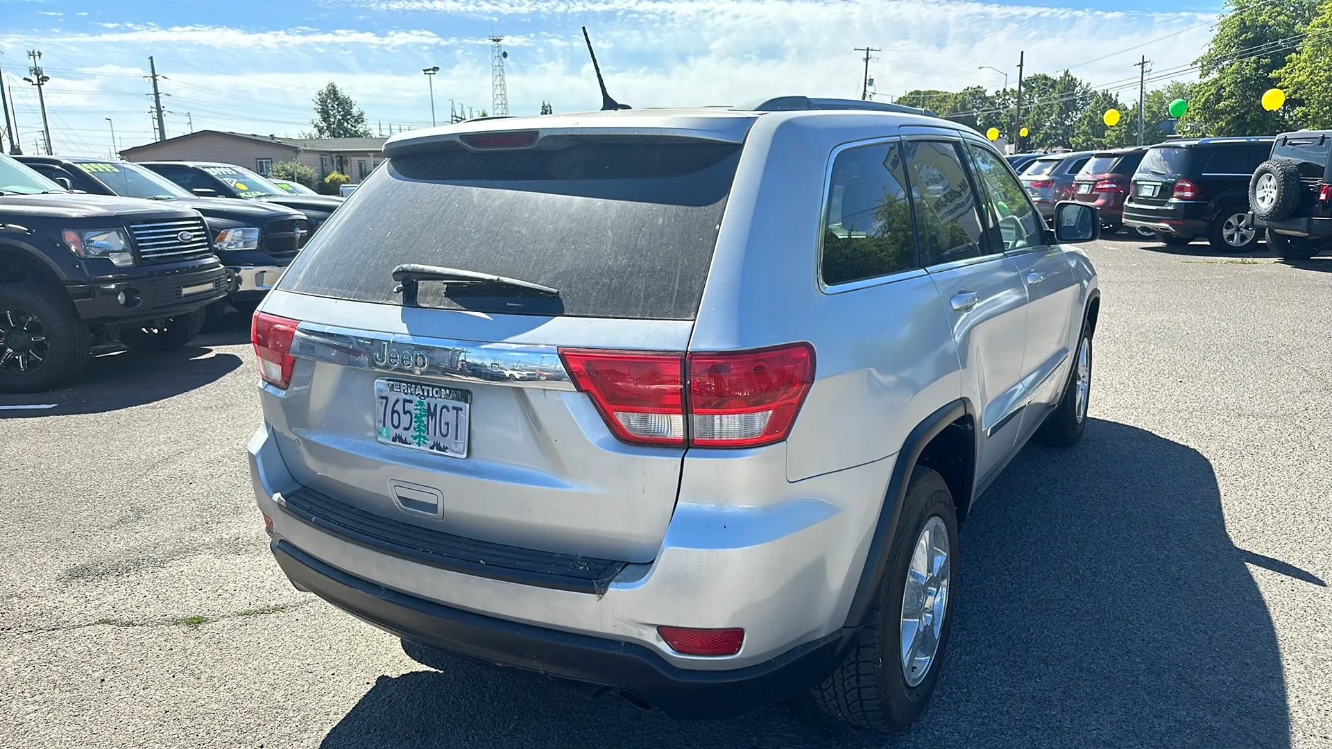 Used 2011 Jeep Grand Cherokee Laredo AWD/4WD image 16