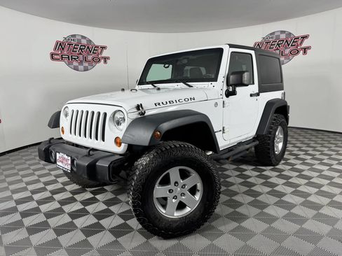 Used 2011 Jeep Wrangler Rubicon w/ Dual Top Group AWD/4WD image 1