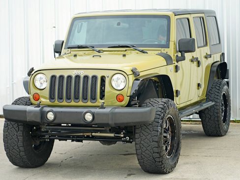 Used 2013 Jeep Wrangler Unlimited Sport w/ Mopar Black Appearance Group image 39