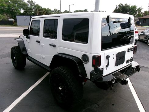 Used 2013 Jeep Wrangler Unlimited Rubicon w/ Dual Top Group AWD/4WD image 5