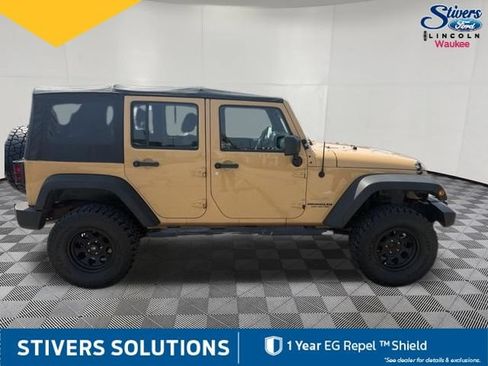 Used 2013 Jeep Wrangler Unlimited Sport w/ Mopar Black Appearance Group AWD/4WD image 5
