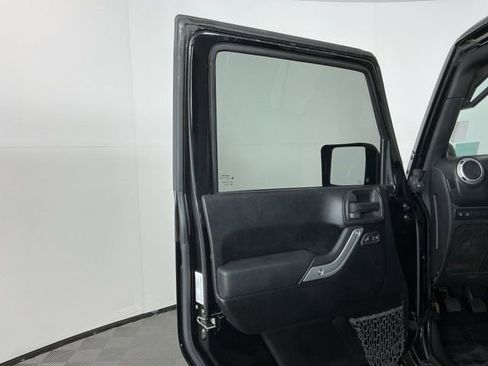 Used 2012 Jeep Wrangler Unlimited Rubicon w/ Dual Top Group AWD/4WD image 11