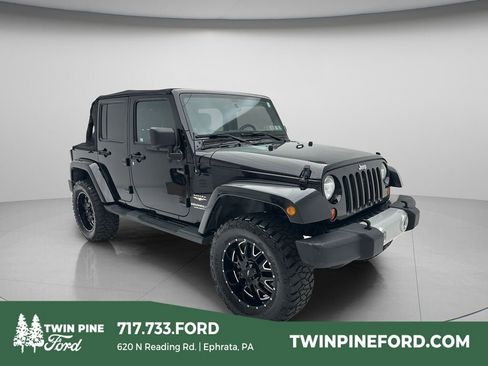 Used 2013 Jeep Wrangler Unlimited Sahara AWD/4WD image 1