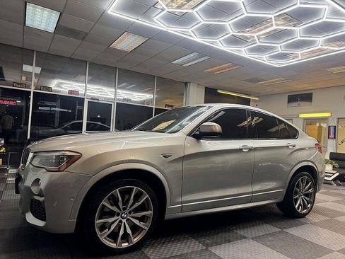 Used 2016 BMW X4 M40i AWD/4WD image 1