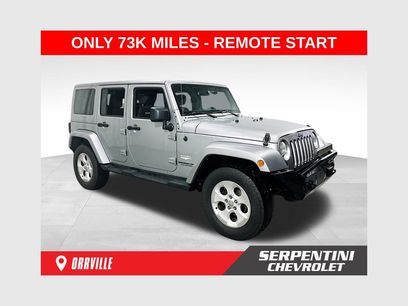 Used 2014 Jeep Wrangler Unlimited Sahara w/ Dual Top Group