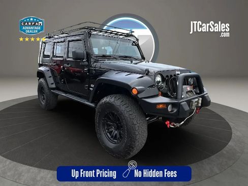 Used 2010 Jeep Wrangler Unlimited Sport w/ Trailer Tow Group AWD/4WD image 1