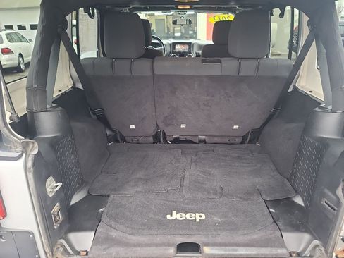 Used 2012 Jeep Wrangler Unlimited Sport w/ Dual Top Group AWD/4WD image 12