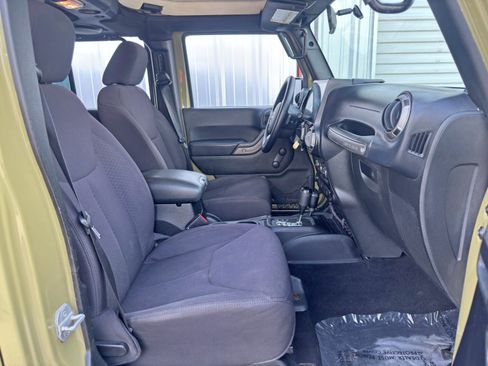 Used 2013 Jeep Wrangler Unlimited Sport w/ Mopar Black Appearance Group image 14