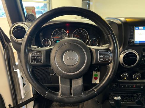 Used 2014 Jeep Wrangler Unlimited Rubicon w/ Dual Top Group AWD/4WD image 11