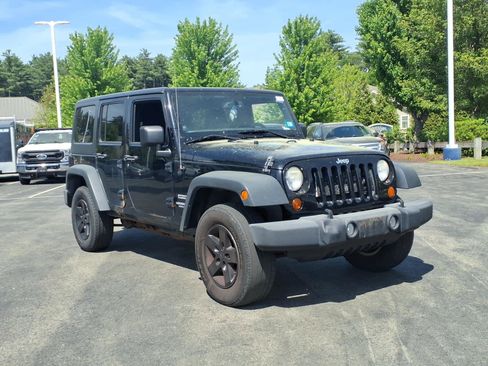 Used 2013 Jeep Wrangler Unlimited Sport AWD/4WD image 1