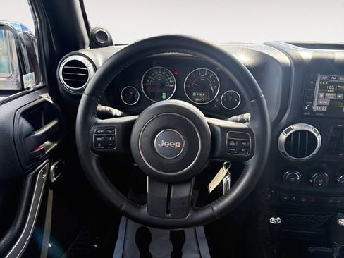 Used 2013 Jeep Wrangler Unlimited Sahara w/ Mopar Chrome Edition Group AWD/4WD image 12