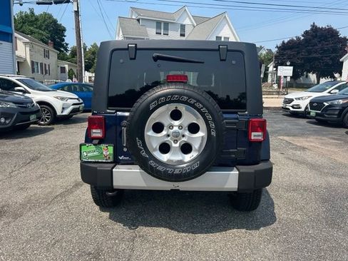 Used 2013 Jeep Wrangler Unlimited Sahara w/ Dual Top Group AWD/4WD image 9