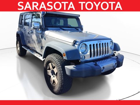 Used 2016 Jeep Wrangler Unlimited Sport image 1