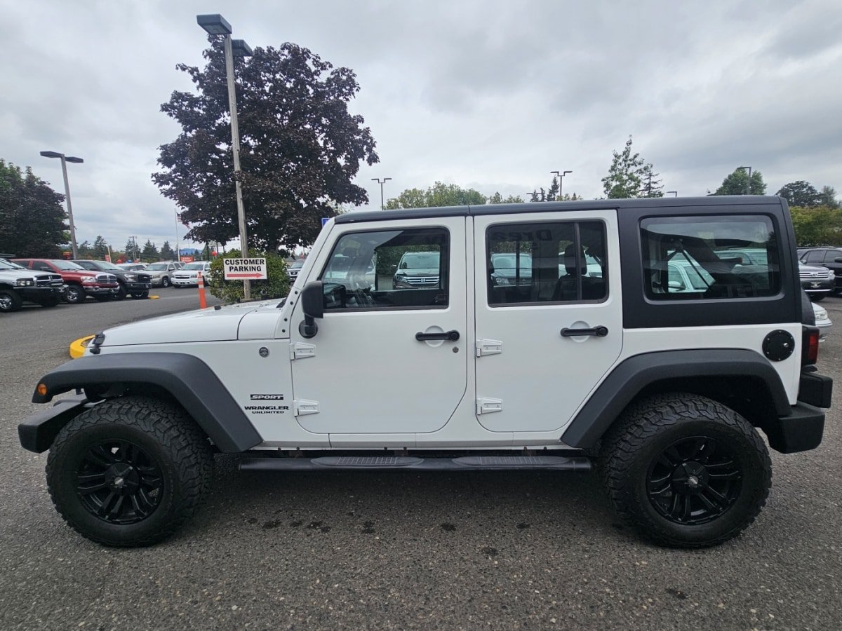 Used 2013 Jeep Wrangler Unlimited Sport AWD/4WD image 1