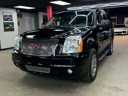 Used 2013 GMC Yukon Denali AWD/4WD image 1