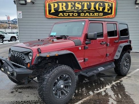 Used 2012 Jeep Wrangler Unlimited Sport image 1