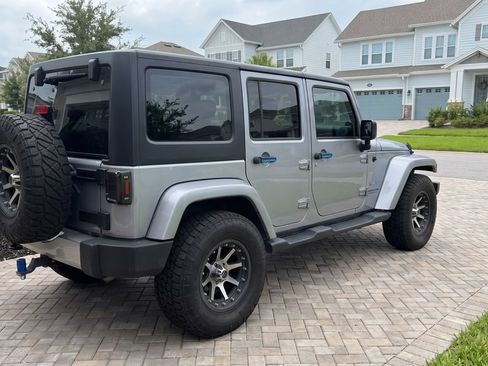 Used 2013 Jeep Wrangler Unlimited Sahara w/ Connectivity Group AWD/4WD image 2