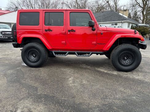 Used 2014 Jeep Wrangler Unlimited Sahara w/ Dual Top Group AWD/4WD image 6