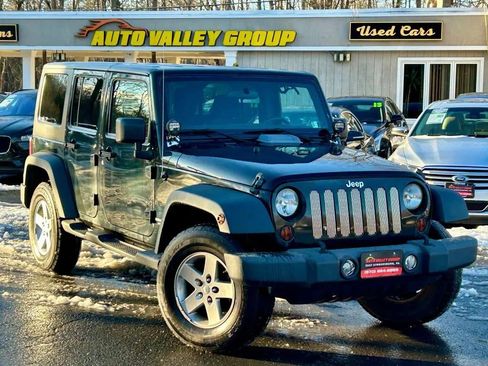 Used 2012 Jeep Wrangler Unlimited Sport image 1