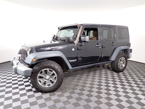 Used 2014 Jeep Wrangler Unlimited Rubicon w/ Dual Top Group AWD/4WD image 8