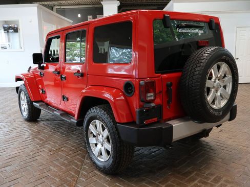 Used 2012 Jeep Wrangler Unlimited Sahara w/ Dual Top Group AWD/4WD image 5