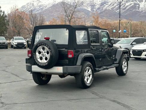Used 2014 Jeep Wrangler Unlimited Sahara w/ Dual Top Group AWD/4WD image 3
