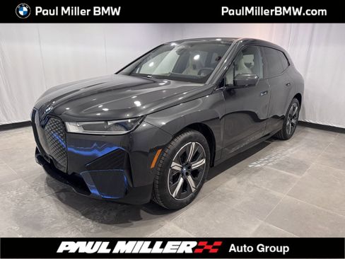 Used 2025 BMW iX xDrive50 w/ Premium Package image 1