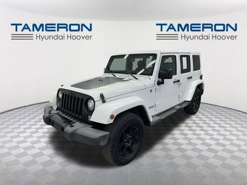 Used 2014 Jeep Wrangler Unlimited Sahara AWD/4WD image 1